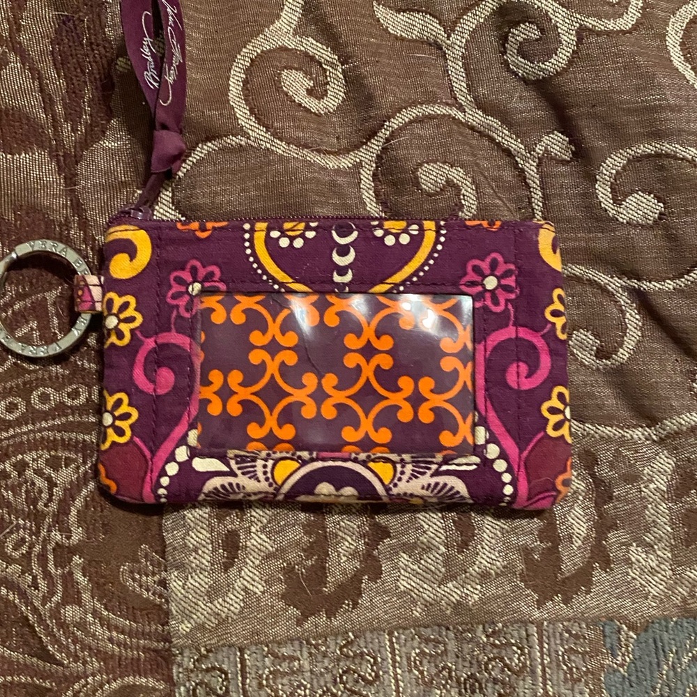 Purple, pink, and orange, Vera Bradley ID carrier